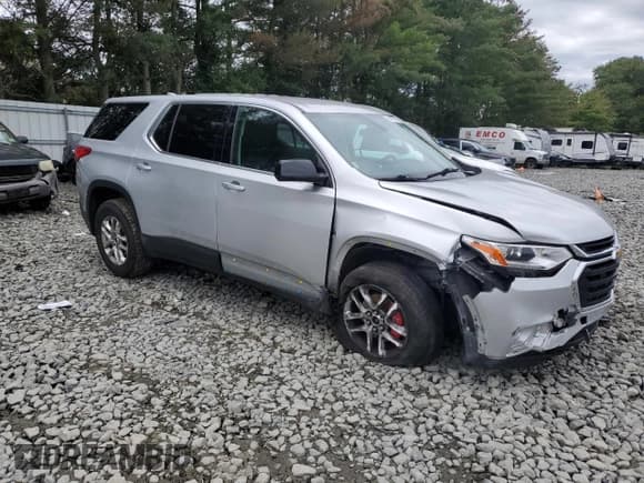 ✅ 2020 Chevrolet Traverse LS • VIN: 1GNERLKW7LJ163393 • Lot: 69497215. Listed on Copart with 103,250 mi. Free auction sales archive from the USA and detailed vehicle history report at DreamBid. Image 4.
