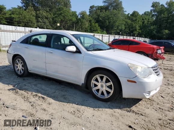 ✅ 2007 Chrysler Sebring • VIN: 1C3LC46K67N522735 • Lot: 65268365. Listed on Copart with 196,019 mi. Free auction sales archive from the USA and detailed vehicle history report at DreamBid. Image 4.