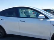 ✅ 2026 Tesla Model Y Long Range Launch Series • VIN: 7SAYGDEE6TF356259 • Лот: 42583010. Опубликован ранее на IAAI с пробегом 738 миль. Бесплатный доступ к архиву аукционных продаж из США и подробный отчёт об истории автомобиля на DreamBid. Изображение 14.