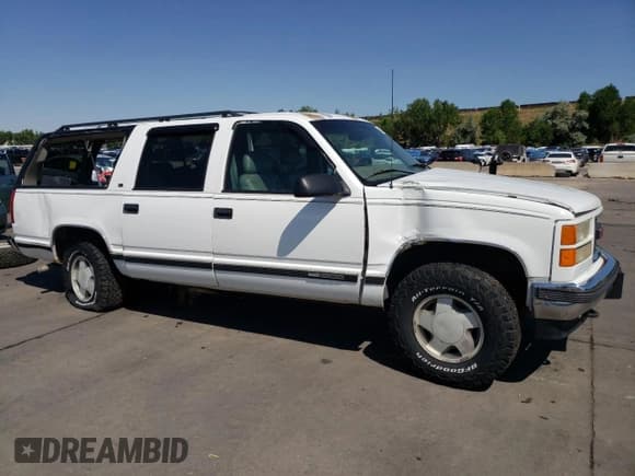 ✅ 1998 GMC Suburban • VIN: 3GKFK16R0WG502287 • Lot: 62323314. Listed on Copart with 181,638 mi. Free auction sales archive from the USA and detailed vehicle history report at DreamBid. Image 4.