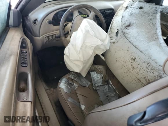 ✅ 2002 Ford Mustang Deluxe • VIN: 1FAFP44412F113486 • Lot: 69901725. Listed on Copart with 214,518 mi. Free auction sales archive from the USA and detailed vehicle history report at DreamBid. Image 8.