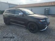 ✅ 2014 Jeep Grand Cherokee Summit • VIN: 1C4RJFJM2EC355086 • Lot: 91083805. Listed on Copart with 71,985 mi. Free auction sales archive from the USA and detailed vehicle history report at DreamBid. Image 4.