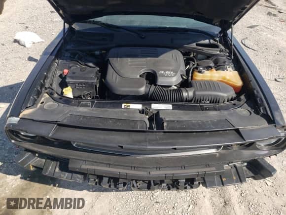 2014 Dodge Challenger SXT z VIN 2C3CDYAG4EH116448, wystawiony jako Copart lot #74385454 z przebiegiem 239 499 mil mil oraz Czysty tytuł • Clean title. Historia ofert i sprzedaży dostępna na DreamBid. Obrazek 11.