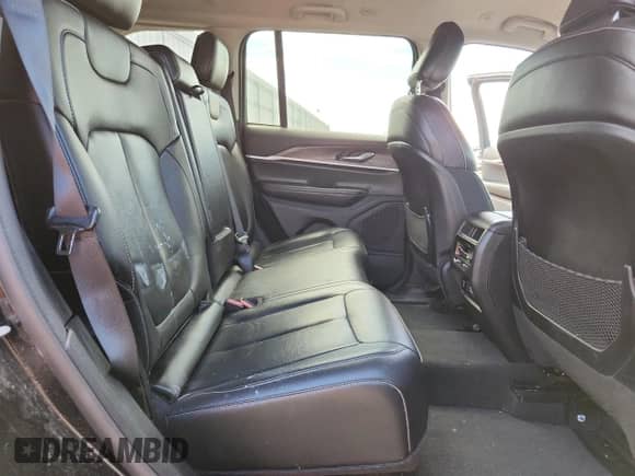2023 Jeep Grand Cherokee Limited с VIN 1C4RJHBG8PC510361, выставлен на аукционе Copart как лот 84289745 с пробегом 63 500 миль миль и Списание • Salvage title. История ставок и продаж доступна на DreamBid. Изображение 11.