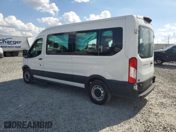 ✅ 2020 Ford Transit Passenger XL • VIN: 1FBAX2C85LKA65128 • Lot: 81118815. Listed on Copart with 82,443 mi. Free auction sales archive from the USA and detailed vehicle history report at DreamBid. Image 2.
