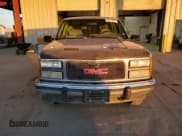 ✅ 1993 GMC Suburban • VIN: 1GKFK16KXPJ742708 • Lot: 84293994. Wystawiony na Copart z przebiegiem 162 477 mil. Bezpłatny archiwum sprzedaży aukcyjnych z USA i szczegółowy raport historii pojazdu na DreamBid. Zdjęcie 5.