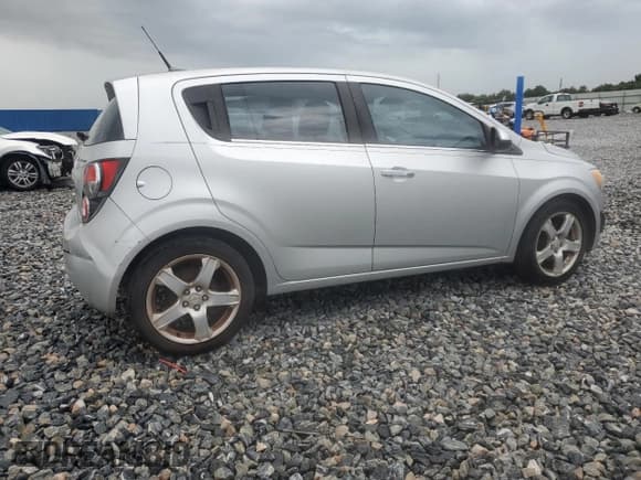 ✅ 2012 Chevrolet Sonic LTZ • VIN: 1G1JE6SH7C4123988 • Lot: 64845065. Listed on Copart with 130,139 mi. Free auction sales archive from the USA and detailed vehicle history report at DreamBid. Image 3.