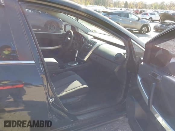 ✅ 2008 Mazda CX-7 Grand Touring • VIN: JM3ER29L880208165 • Лот: 43595808. Опубликован ранее на IAAI с пробегом 214 900 миль. Бесплатный доступ к архиву аукционных продаж из США и подробный отчёт об истории автомобиля на DreamBid. Изображение 5.