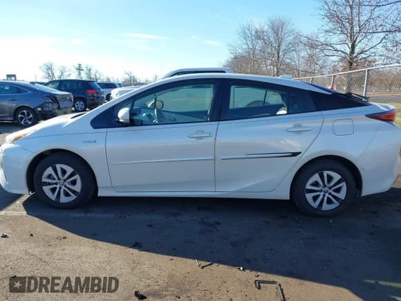 ✅ 2018 Toyota Prius Two • VIN: JTDKBRFU8J3066748 • Lot: 43765334. Listed on IAAI with 102,218 mi. Free auction sales archive from the USA and detailed vehicle history report at DreamBid. Image 14.