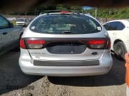 ✅ 2003 Ford Taurus • VIN: 1FAHP59S73A170554 • Лот: 69981595. Опубликован ранее на Copart с пробегом 214 652 миль. Бесплатный доступ к архиву аукционных продаж из США и подробный отчёт об истории автомобиля на DreamBid. Изображение 6.