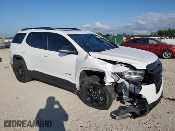 ✅ 2021 GMC Acadia AT4 • VIN: 1GKKNLLSXMZ103165 • Lot: 93613775. Listed on Copart with 76,710 mi. Free auction sales archive from the USA and detailed vehicle history report at DreamBid. Image 4.