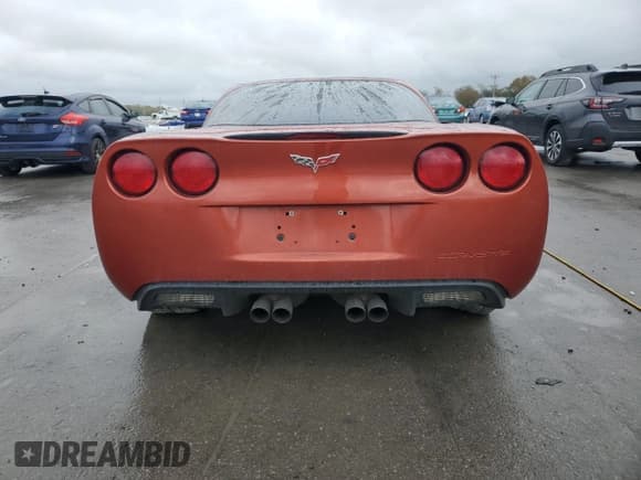 ✅ 2006 Chevrolet Corvette • VIN: 1G1YY26U265102681 • Lot: 89820615. Wystawiony na Copart z przebiegiem 84 897 mil. Bezpłatny archiwum sprzedaży aukcyjnych z USA i szczegółowy raport historii pojazdu na DreamBid. Zdjęcie 6.