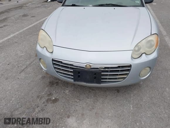 ✅ 2004 Chrysler Sebring • VIN: 4C3AG42G84E127527 • Lot: 43802397. Listed on IAAI with 116,824 mi. Free auction sales archive from the USA and detailed vehicle history report at DreamBid. Image 13.