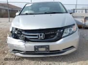✅ 2014 Honda Odyssey EX-L • VIN: 5FNRL5H67EB068308 • Lot: 43629480. Wystawiony na IAAI z przebiegiem 88 071 mil. Bezpłatny archiwum sprzedaży aukcyjnych z USA i szczegółowy raport historii pojazdu na DreamBid. Zdjęcie 6.