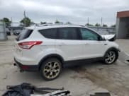 ✅ 2013 Ford Escape Titanium • VIN: 1FMCU9J92DUA71150 • Lot: 58398455. Listed on Copart with Not provided. Free auction sales archive from the USA and detailed vehicle history report at DreamBid. Image 3.