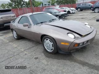 ✅ 1983 Porsche 928 • VIN: WP0JB0928DS860094 • Lot: 42106022. Wystawiony na IAAI z przebiegiem 121 873 mil. Bezpłatny archiwum sprzedaży aukcyjnych z USA i szczegółowy raport historii pojazdu na DreamBid. Zdjęcie 1.