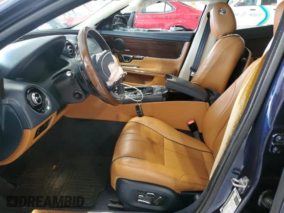 ✅ 2014 Jaguar XJ Portfolio • VIN: SAJWJ2GD1E8V61328 • Лот: 64867705. Опубликован ранее на Copart с пробегом 78 024 миль. Бесплатный доступ к архиву аукционных продаж из США и подробный отчёт об истории автомобиля на DreamBid. Изображение 7.