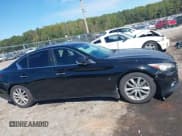 ✅ 2014 Infiniti Q50 Premium • VIN: JN1BV7AP9EM674388 • Lot: 43329851. Listed on IAAI with 213,850 mi. Free auction sales archive from the USA and detailed vehicle history report at DreamBid. Image 13.