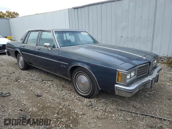 ✅ 1985 Oldsmobile Delta Royale • VIN: 1G3BN69YXF9080322 • Lot: 78670094. Wystawiony na Copart z przebiegiem 58 231 mil. Bezpłatny archiwum sprzedaży aukcyjnych z USA i szczegółowy raport historii pojazdu na DreamBid. Zdjęcie 4.