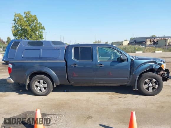 2013 Nissan Frontier SV z VIN 1N6AD0FV1DN725754, wystawiony jako IAAI lot #43213243 z przebiegiem 160 038 mil mil oraz . Historia ofert i sprzedaży dostępna na DreamBid. Obrazek 13.