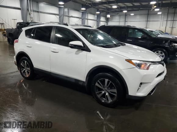 ✅ 2018 Toyota RAV4 XLE • VIN: JTMRFREV3JJ734190 • Lot: 89832365. Listed on Copart with 141,678 mi. Free auction sales archive from the USA and detailed vehicle history report at DreamBid. Image 4.