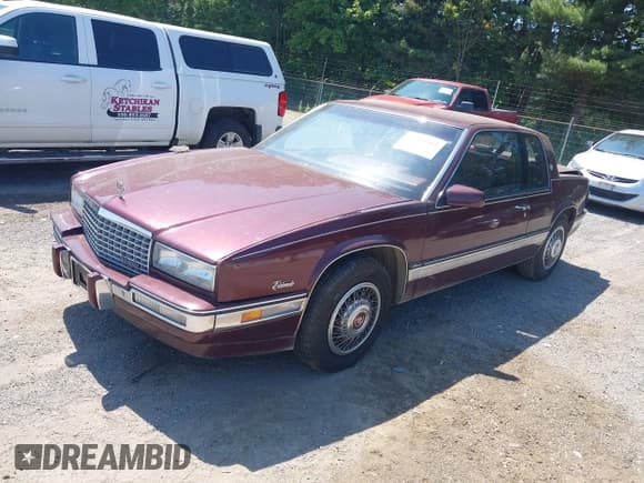 ✅ 1989 Cadillac Eldorado • VIN: 1G6EL1154KU618059 • Lot: 42816802. Wystawiony na IAAI z przebiegiem 110 725 mil. Bezpłatny archiwum sprzedaży aukcyjnych z USA i szczegółowy raport historii pojazdu na DreamBid. Zdjęcie 2.