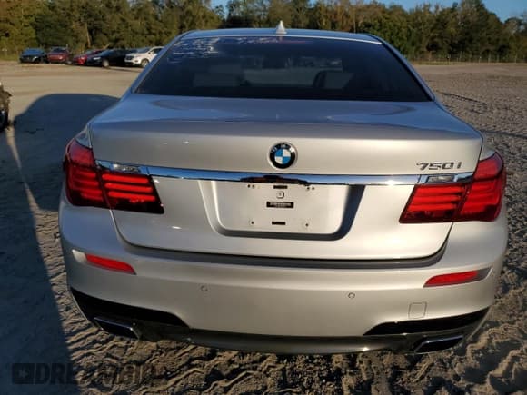 ✅ 2015 BMW 7 Series 750i • VIN: WBAYA8C53FGK19778 • Lot: 77258684. Listed on Copart with 34,535 mi. Free auction sales archive from the USA and detailed vehicle history report at DreamBid. Image 6.