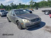 ✅ 2006 Kia Optima LX • VIN: KNAGE123465020581 • Лот: 42278893. Опубликован ранее на IAAI с пробегом 266 468 миль. Бесплатный доступ к архиву аукционных продаж из США и подробный отчёт об истории автомобиля на DreamBid. Изображение 1.