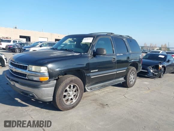 ✅ 2001 Chevrolet Tahoe LT • VIN: 1GNEK13T01J118662 • Lot: 43786967. Listed on IAAI with 346,882 mi. Free auction sales archive from the USA and detailed vehicle history report at DreamBid. Image 2.