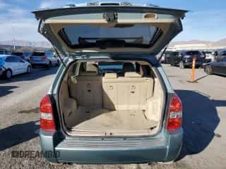 2006 Hyundai Tucson GLS z VIN KM8JN12D16U461376, wystawiony jako Copart lot #82132324 z przebiegiem 127 474 mil mil oraz Szkoda całkowita • Salvage title. Historia ofert i sprzedaży dostępna na DreamBid. Obrazek 6.