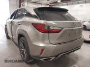 ✅ 2017 Lexus RX 350 • VIN: 2T2BZMCA5HC111179 • Lot: 42115522. Listed on IAAI with 130,249 mi. Free auction sales archive from the USA and detailed vehicle history report at DreamBid. Image 3.