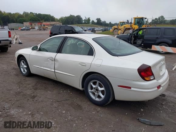 ✅ 2002 Oldsmobile Aurora • VIN: 1G3GR64H524128107 • Lot: 43307374. Listed on IAAI with 157,189 mi. Free auction sales archive from the USA and detailed vehicle history report at DreamBid. Image 6.