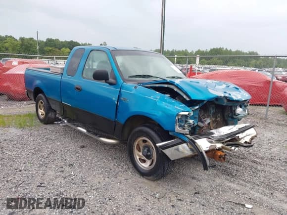 ✅ 1998 Ford F-150 • VIN: 1FTZX172XWNA93590 • Lot: 42630006. Listed on IAAI with 180,178 mi. Free auction sales archive from the USA and detailed vehicle history report at DreamBid. Image 1.