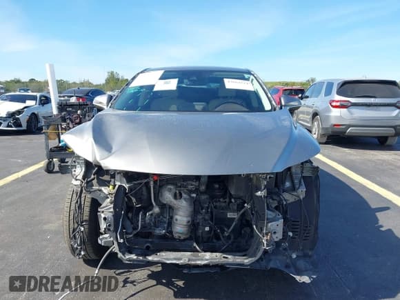 ✅ 2020 Lexus RX 350 • VIN: 2T2AZMAA2LC165451 • Lot: 43664524. Listed on IAAI with 103,122 mi. Free auction sales archive from the USA and detailed vehicle history report at DreamBid. Image 13.