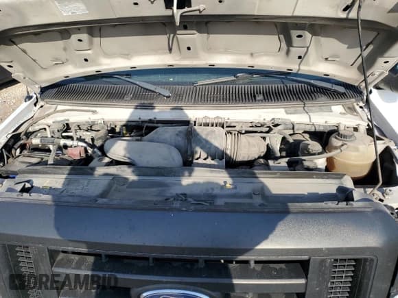 ✅ 2012 Ford Econoline Cargo Recreational • VIN: 1FTNE2EL0CDB33215 • Lot: 63120784. Wystawiony na Copart z przebiegiem 258 466 mil. Bezpłatny archiwum sprzedaży aukcyjnych z USA i szczegółowy raport historii pojazdu na DreamBid. Zdjęcie 12.