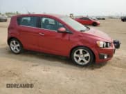 ✅ 2012 Chevrolet Sonic LTZ • VIN: 1G1JE6SH7C4111176 • Lot: 59002575. Listed on Copart with 116,640 mi. Free auction sales archive from the USA and detailed vehicle history report at DreamBid. Image 4.