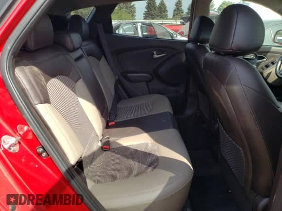 2012 Hyundai Tucson GLS z VIN KM8JU3AC8CU524847, wystawiony jako Copart lot #71528284 z przebiegiem 82 935 mil mil oraz Szkoda całkowita • Salvage title. Historia ofert i sprzedaży dostępna na DreamBid. Obrazek 10.