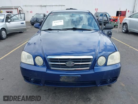 ✅ 2005 Kia Optima LX • VIN: KNAGD128455390068 • Lot: 42466140. Listed on IAAI with 128,832 mi. Free auction sales archive from the USA and detailed vehicle history report at DreamBid. Image 12.