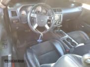 ✅ 2010 Dodge Challenger SRT-8 • VIN: 2B3CJ7DW7AH289099 • Lot: 42083305. Wystawiony na Copart z przebiegiem 154 506 mil. Bezpłatny archiwum sprzedaży aukcyjnych z USA i szczegółowy raport historii pojazdu na DreamBid. Zdjęcie 8.