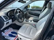 ✅ 2018 Jeep Grand Cherokee Summit • VIN: 1C4RJFJG4JC218011 • Lot: 91515965. Listed on Copart with 140,761 mi. Free auction sales archive from the USA and detailed vehicle history report at DreamBid. Image 9.