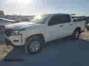 2023 Nissan Frontier SV with VIN 1N6ED1EKXPN633870, listed as a Copart auction lot 82396855 with 23,931 mi miles and Salvage title. Bid and sale history available at DreamBid. Image 1.