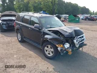 ✅ 2011 Ford Escape Hybrid • VIN: 1FMCU4K37BKA45651 • Lot: 42441757. Listed on IAAI with 504,073 mi. Free auction sales archive from the USA and detailed vehicle history report at DreamBid. Image 1.
