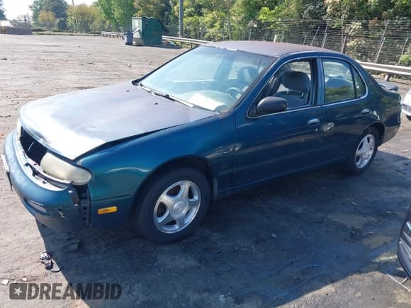 ✅ 1997 Nissan Altima XE • VIN: 1N4BU31D1VC199720 • Lot: 42061192. Listed on IAAI with 312,370 mi. Free auction sales archive from the USA and detailed vehicle history report at DreamBid. Image 17.