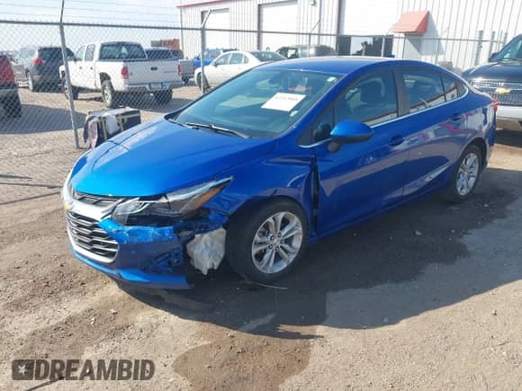 2019 Chevrolet Cruze LT with VIN 1G1BE5SM4K7108535, listed as a IAAI auction lot 43352905 with 102,584 mi miles and . Bid and sale history available at DreamBid. Image 17.