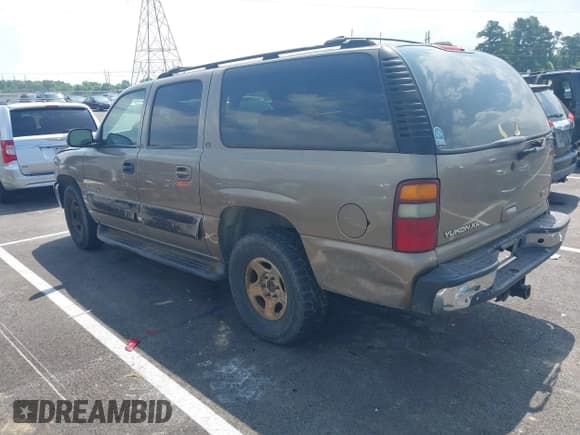 ✅ 2003 GMC Yukon XL SLT • VIN: 1GKEC16Z53J171807 • Lot: 42416309. Wystawiony na IAAI z przebiegiem 378 695 mil. Bezpłatny archiwum sprzedaży aukcyjnych z USA i szczegółowy raport historii pojazdu na DreamBid. Zdjęcie 3.
