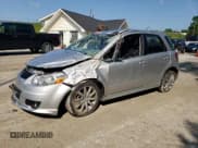 ✅ 2011 Suzuki SX4 Sportback • VIN: JS2YA5A50B6300733 • Лот: 60091875. Опубликован ранее на Copart с пробегом Не указан. Бесплатный доступ к архиву аукционных продаж из США и подробный отчёт об истории автомобиля на DreamBid. Изображение 1.