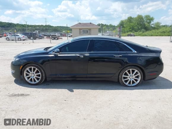 ✅ 2016 Lincoln MKZ • VIN: 3LN6L2J93GR632474 • Lot: 42607060. Listed on IAAI with 99,490 mi. Free auction sales archive from the USA and detailed vehicle history report at DreamBid. Image 14.