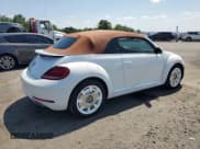 ✅ 2019 Volkswagen Beetle S • VIN: 3VW5DAAT6KM507779 • Lot: 66882335. Listed on Copart with 99,381 mi. Free auction sales archive from the USA and detailed vehicle history report at DreamBid. Image 3.