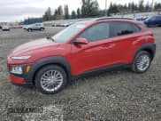 ✅ 2021 Hyundai Kona SEL • VIN: KM8K2CAA8MU628054 • Лот: 74726703. Опубликован ранее на Copart с пробегом 21 495 миль. Бесплатный доступ к архиву аукционных продаж из США и подробный отчёт об истории автомобиля на DreamBid. Изображение 1.