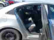 2013 Chevrolet Cruze LS z VIN 1G1PA5SH5D7145164, wystawiony jako IAAI lot #43294377 z przebiegiem 191 872 mil mil oraz . Historia ofert i sprzedaży dostępna na DreamBid. Obrazek 8.